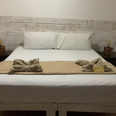 Casa Caribe Cancún Exteriér fotografie A bed