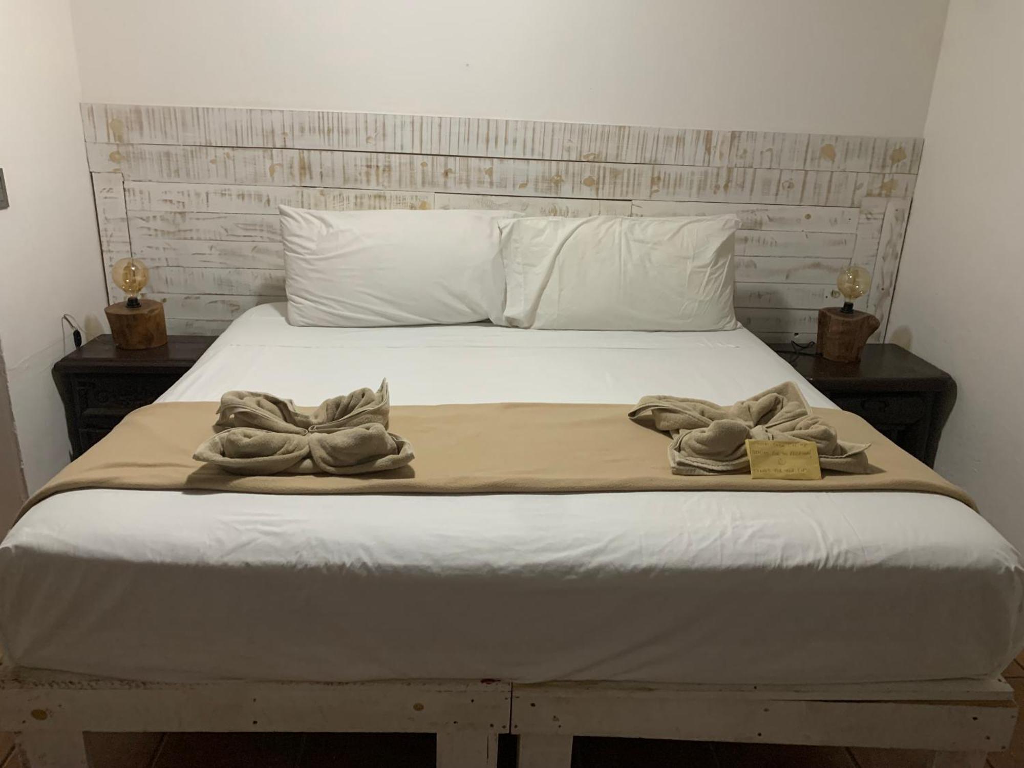 Casa Caribe Cancún Exteriér fotografie A bed